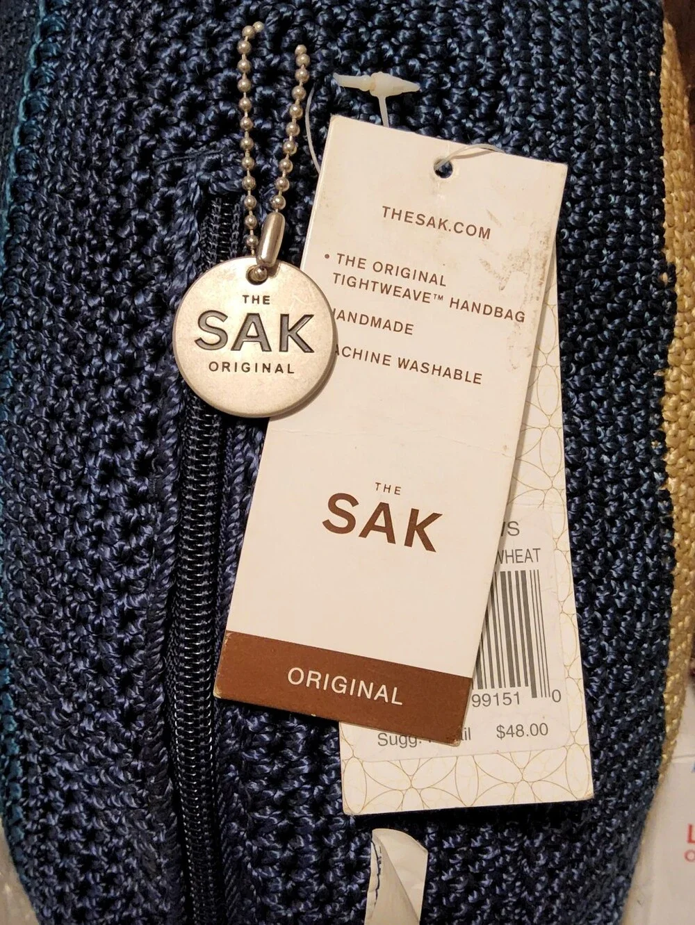 The Sak Round Braided Pillow - Navy & Natural